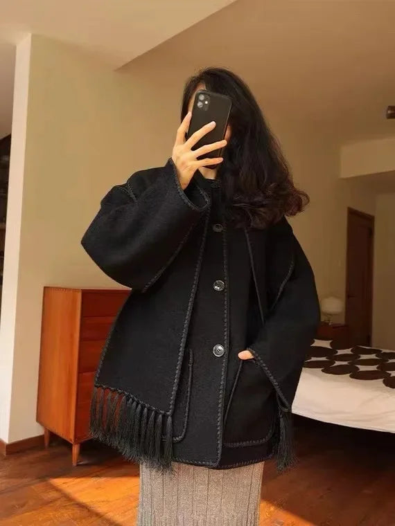 Blouson noir à ornements brodés
